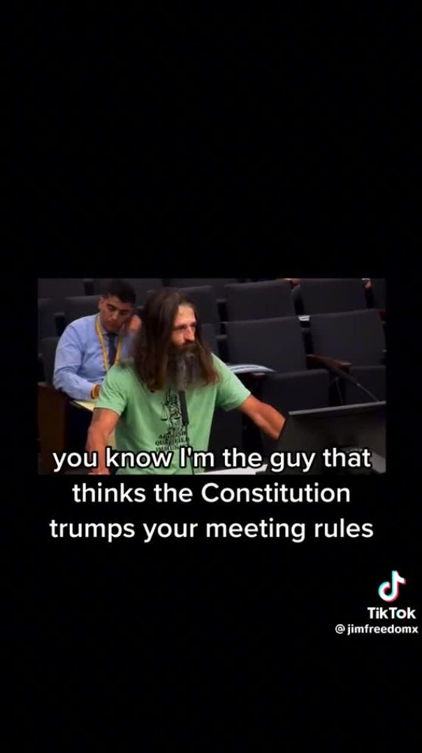 Man gives public statement at a town hall hearing